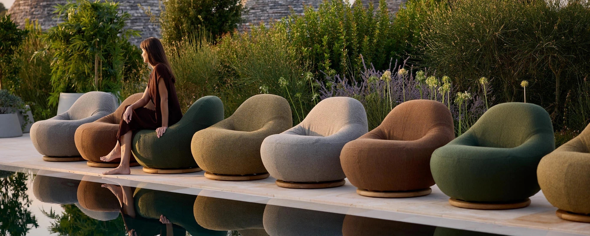 Line of GEM Lounge Chairs in Earthy Colours by Pool