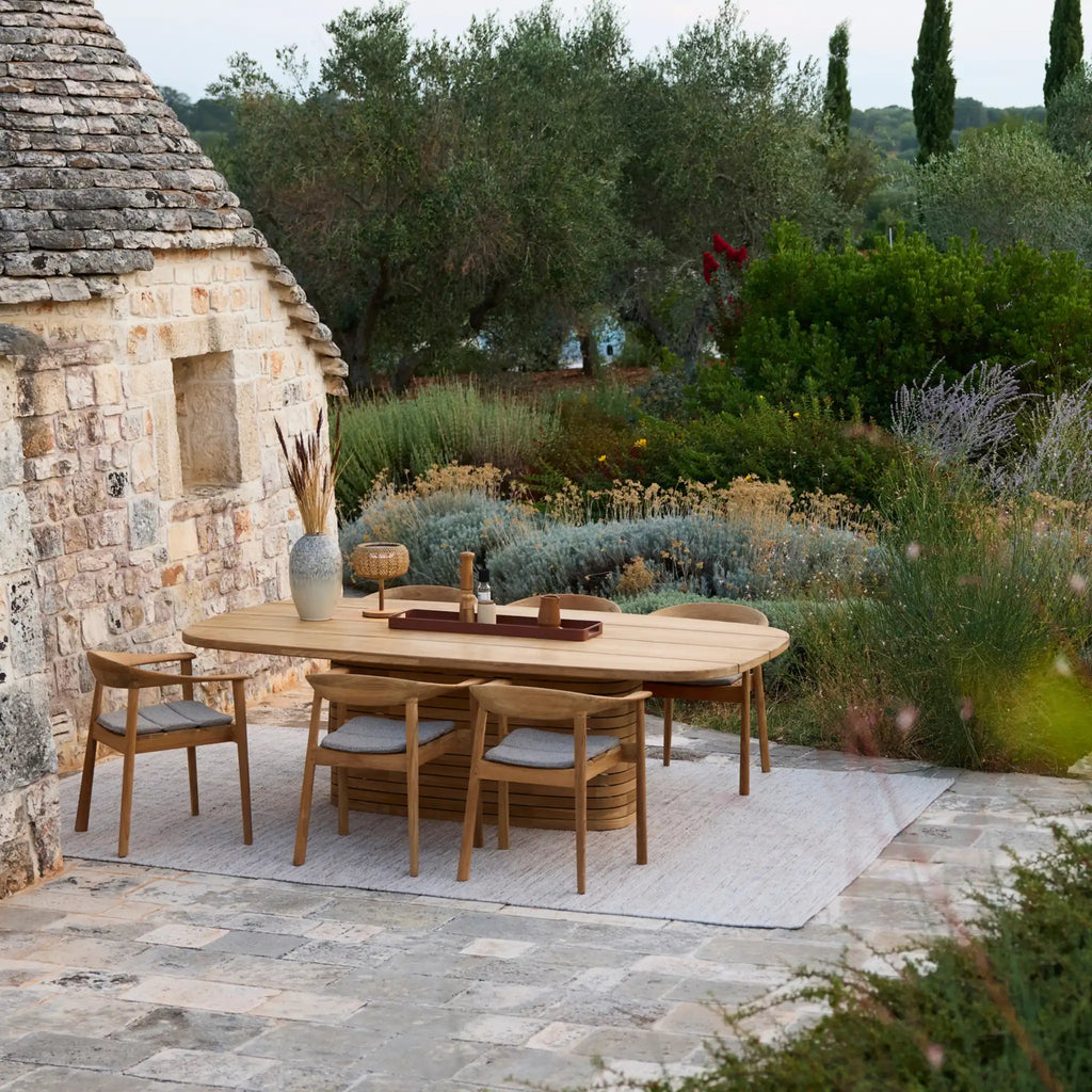 MELLOW Outdoor Oval Dining Table in Teak - Cane-Line | Milola