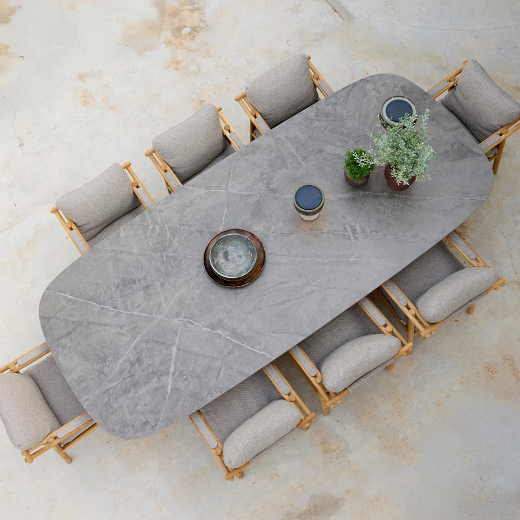 MELLOW Outdoor Oval Dining Table in Teak  Base with Ceramic Top - Cane-Line | Milola