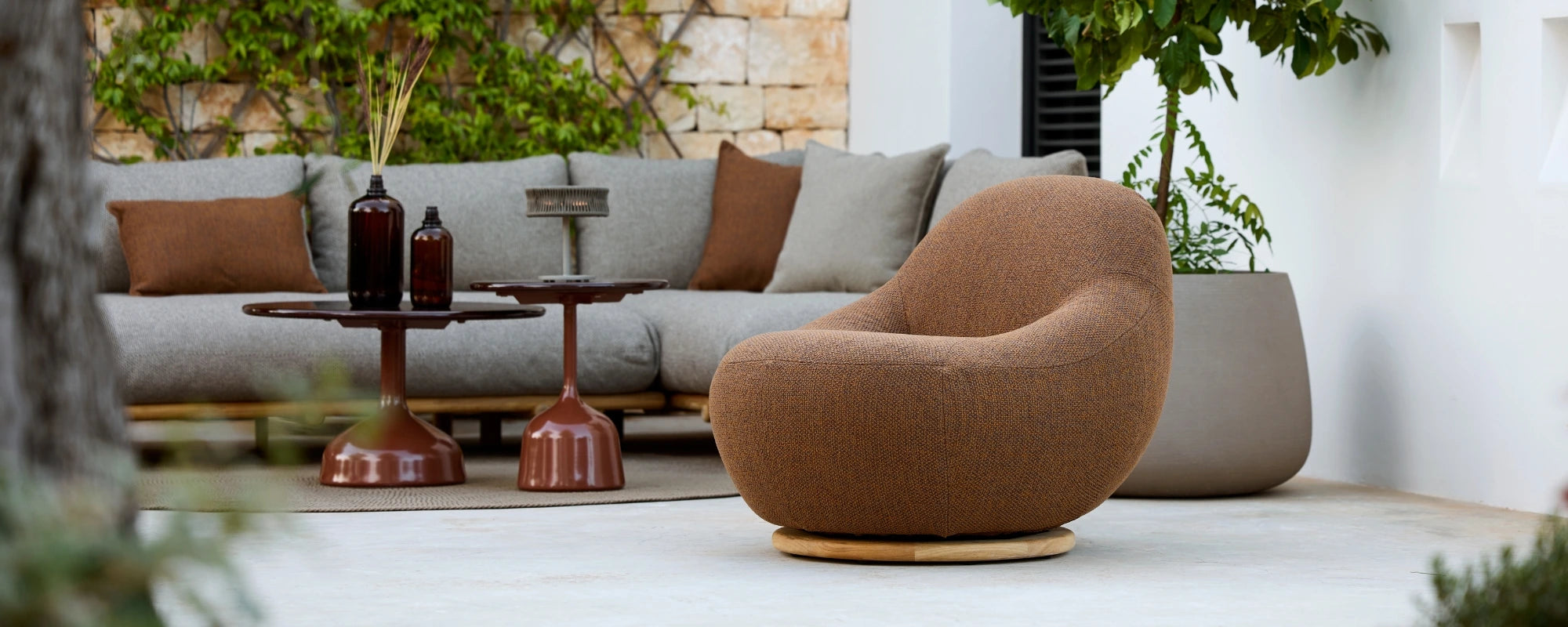 Brown Lounge Chair with Grey STICKS Sofa by Cane Line